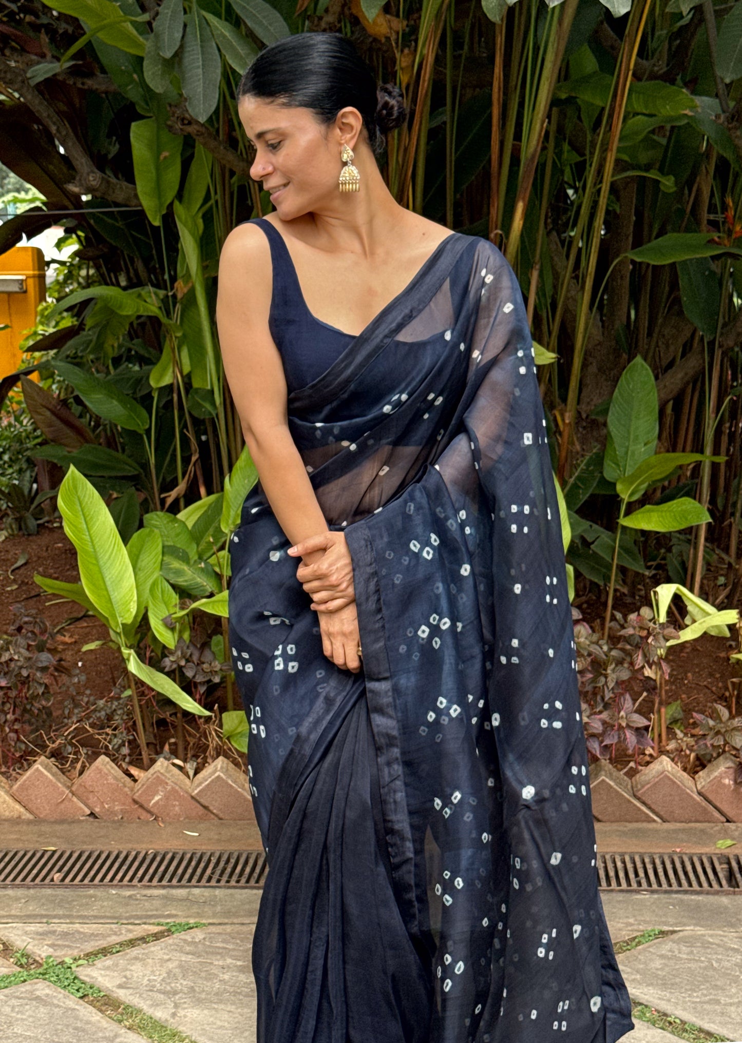 Handloom Organza Silk Saree in Handmade Kumo Shibori With Mulberry Silk Borders.