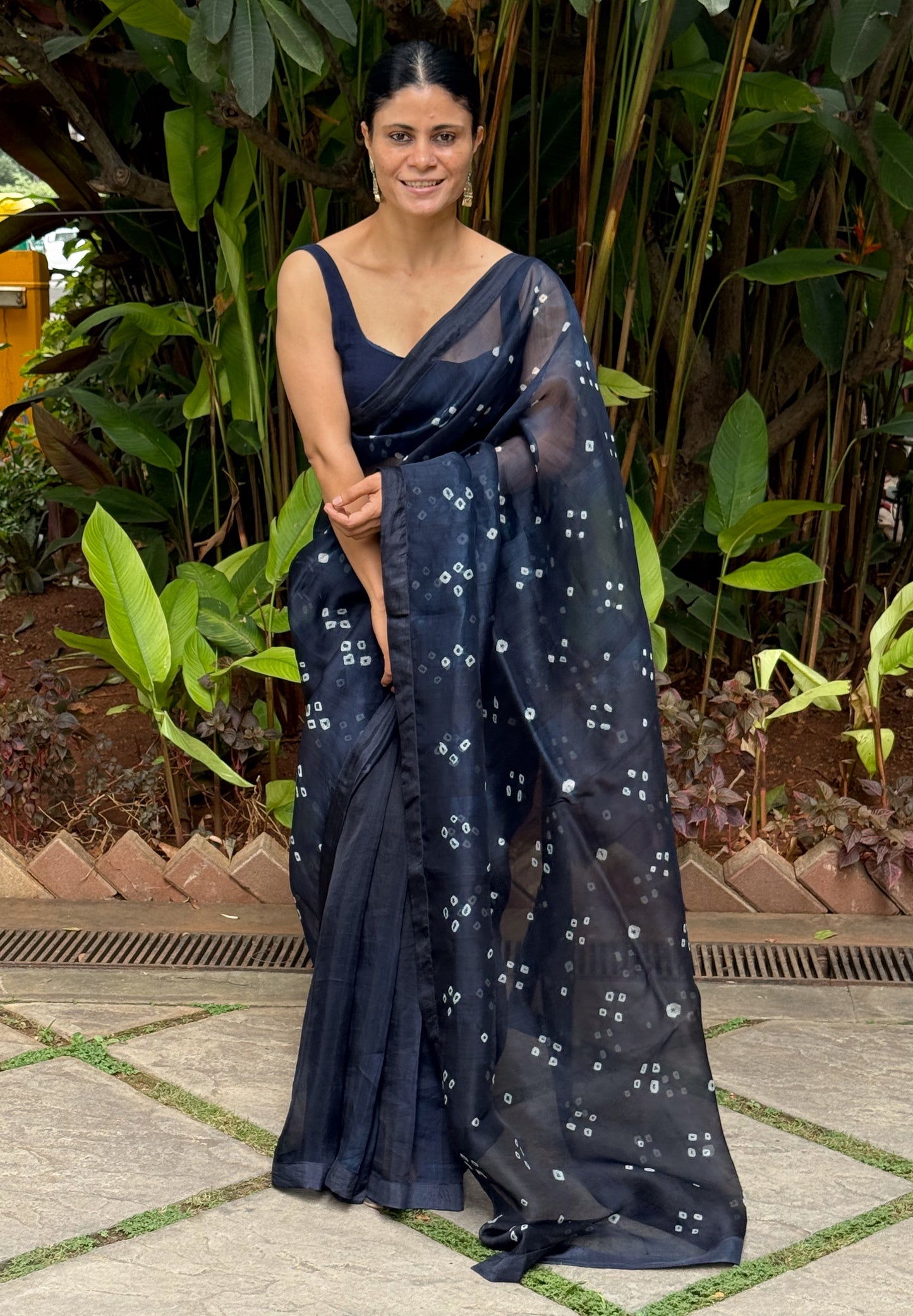 Handloom Organza Silk Saree in Handmade Kumo Shibori With Mulberry Silk Borders.