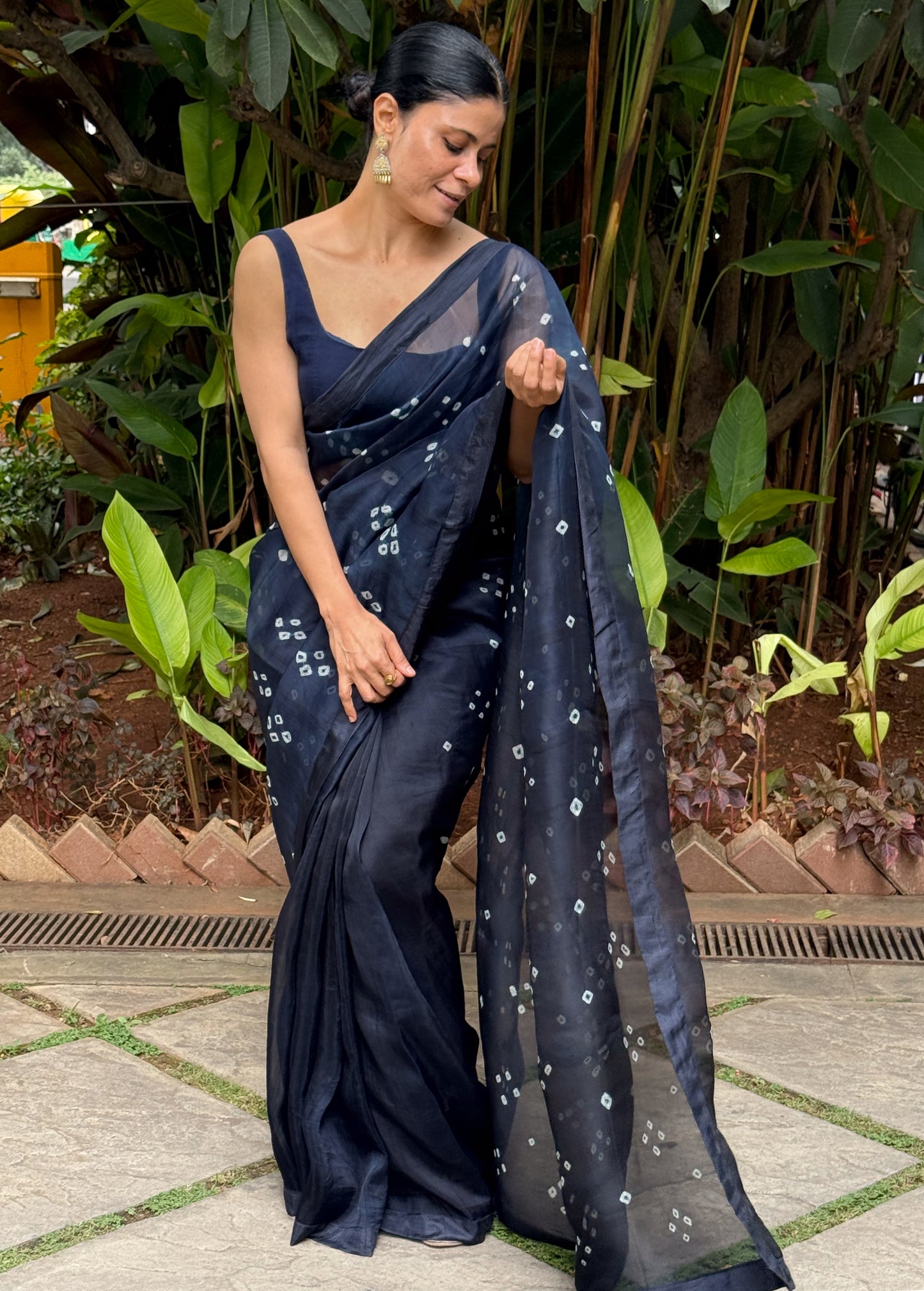 Handloom Organza Silk Saree in Handmade Kumo Shibori With Mulberry Silk Borders.