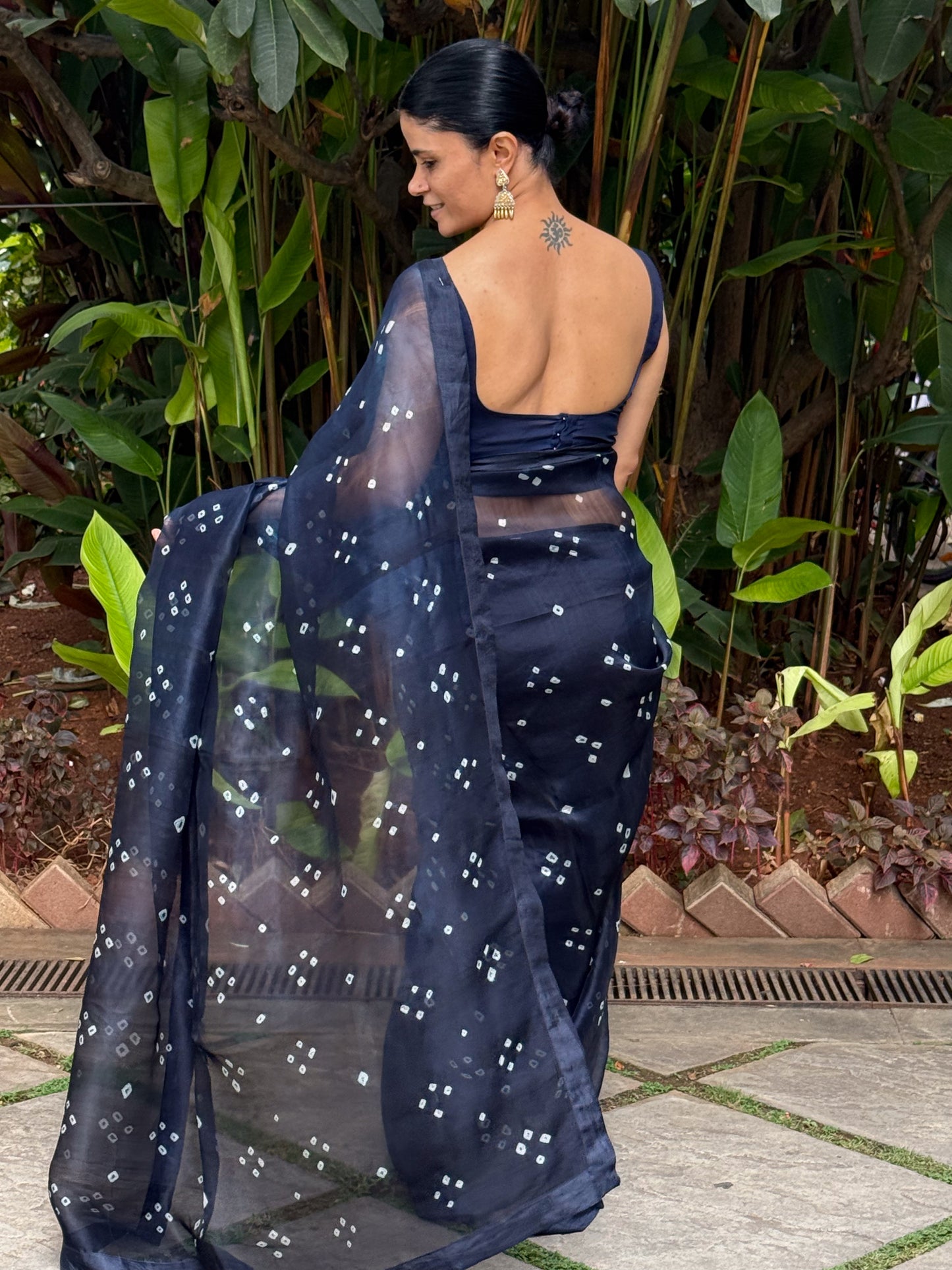 Handloom Organza Silk Saree in Handmade Kumo Shibori With Mulberry Silk Borders.