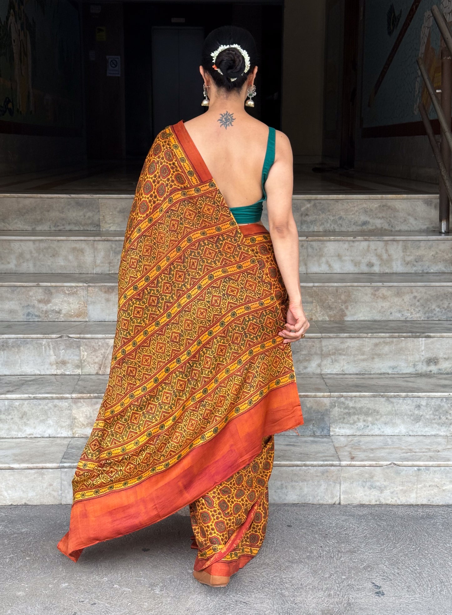 Pure Handblock Printed Ajrakh Crepe Silk Saree.