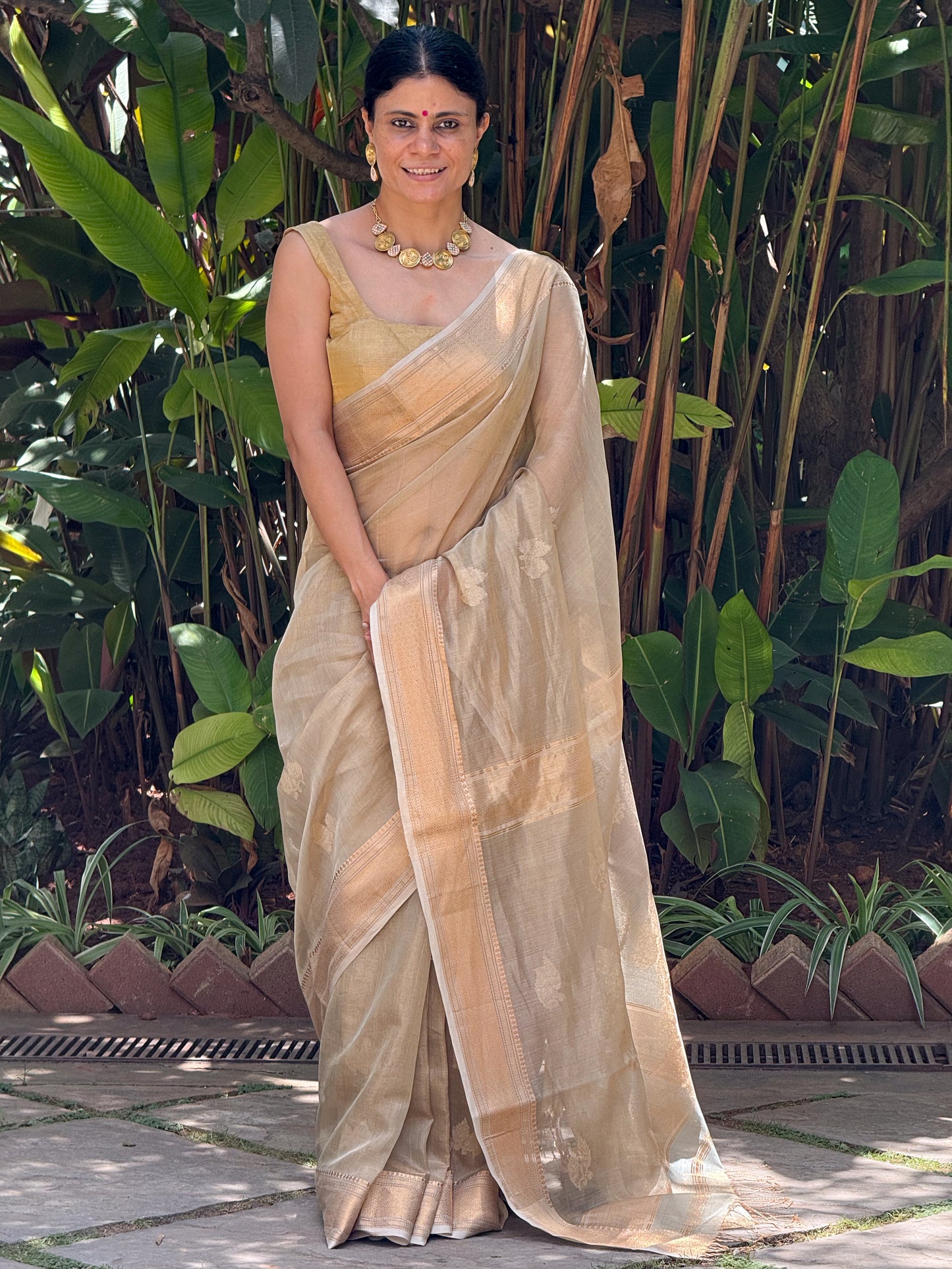Handloom Tissue Silk Saree Adorned With Handmade Motifs