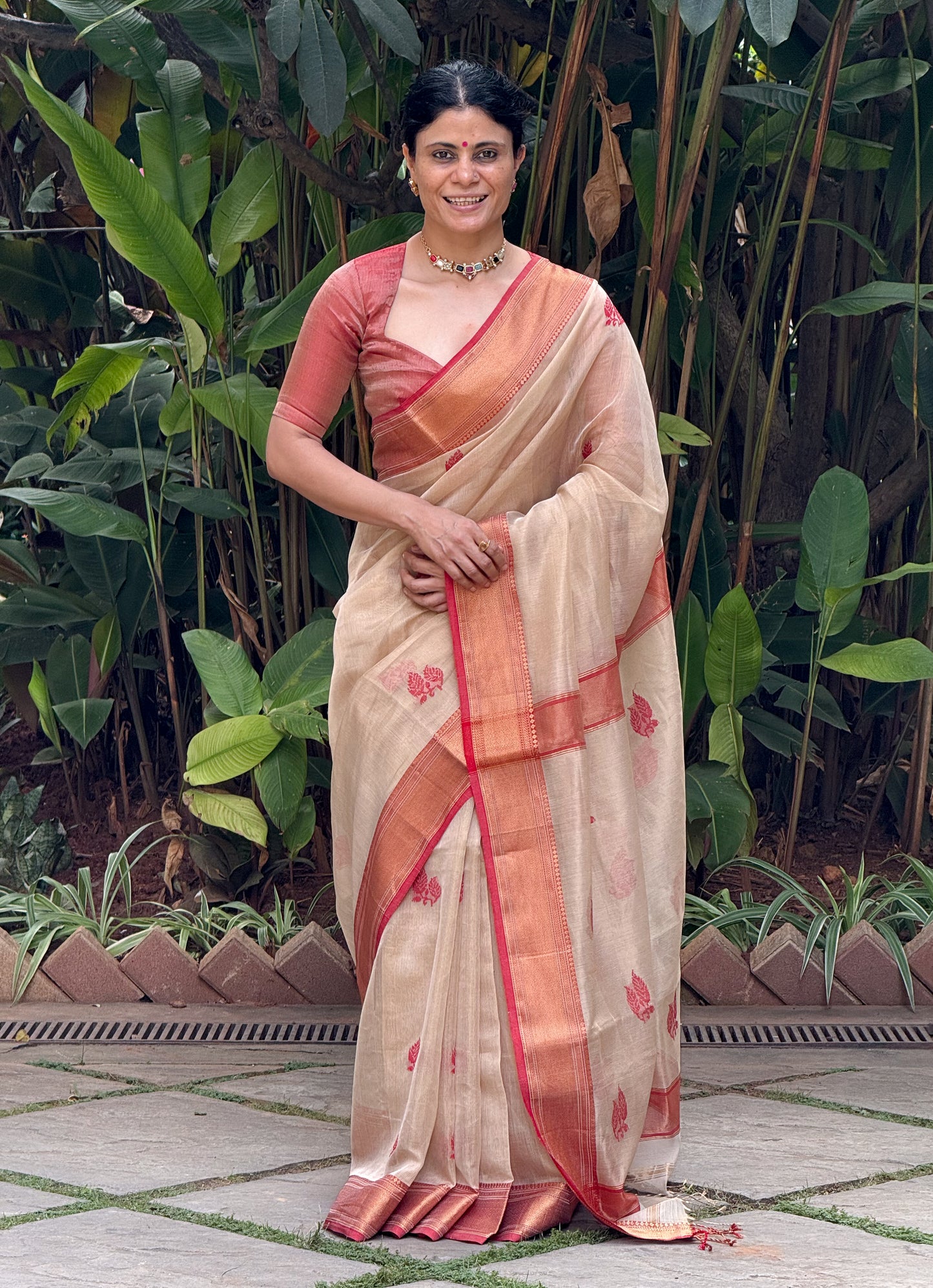 Handloom Tissue Silk Saree Adorned With Handmade Motifs