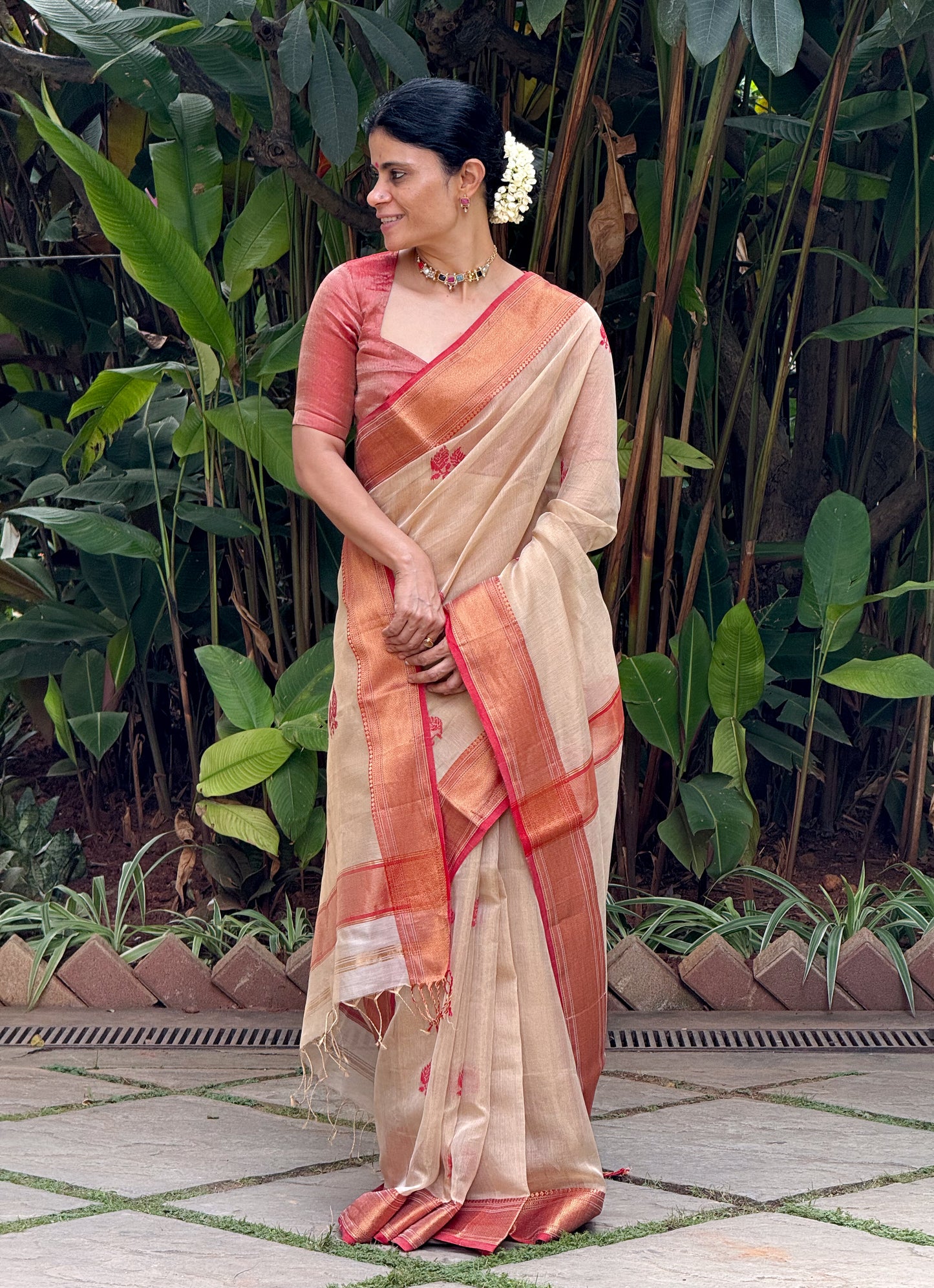 Handloom Tissue Silk Saree Adorned With Handmade Motifs
