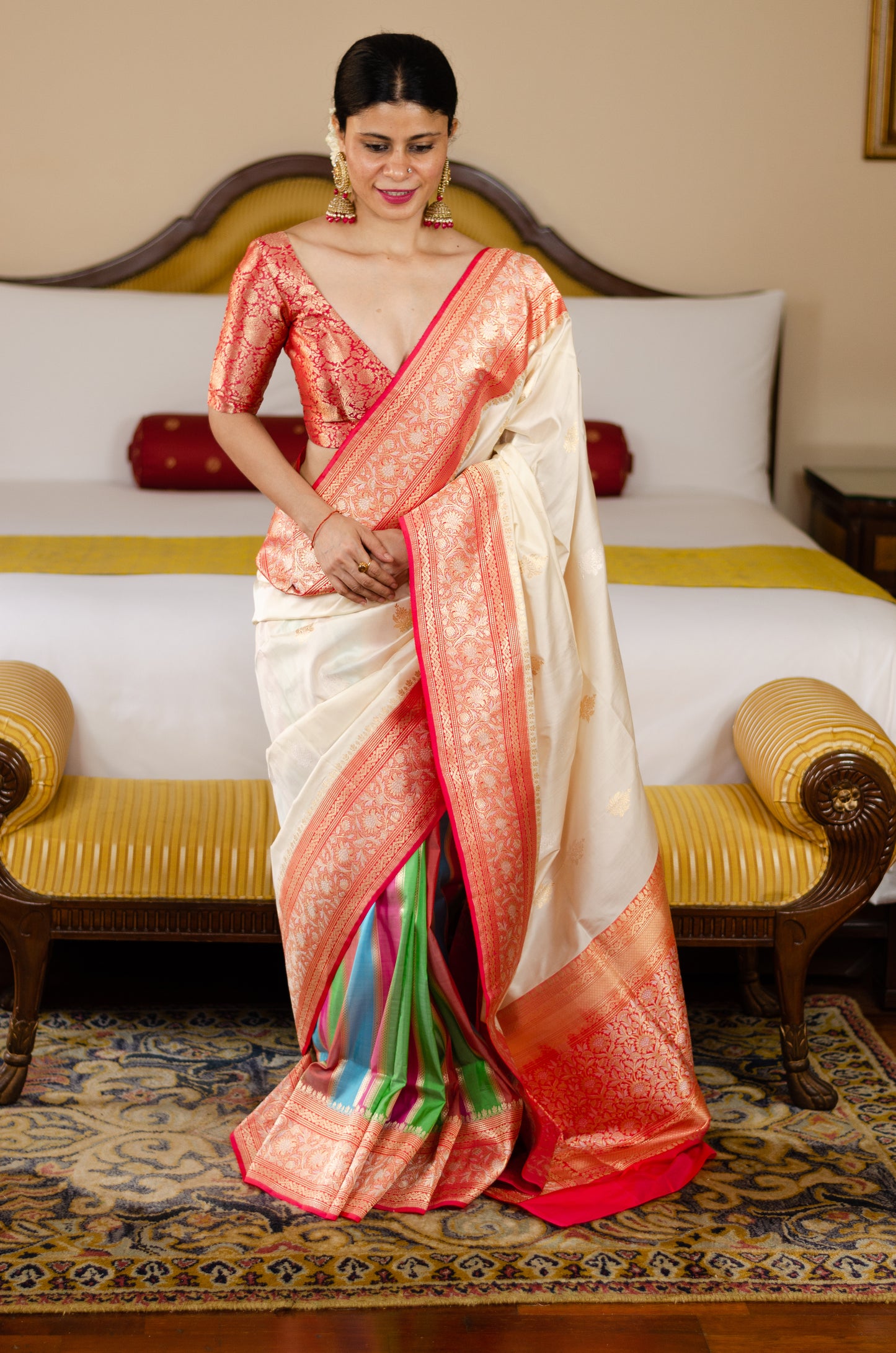 Rich Off white colour anchal and Multicoloured striped in Pleats Pure Katan Silk Kadwa Handwoven Banarasi saree.