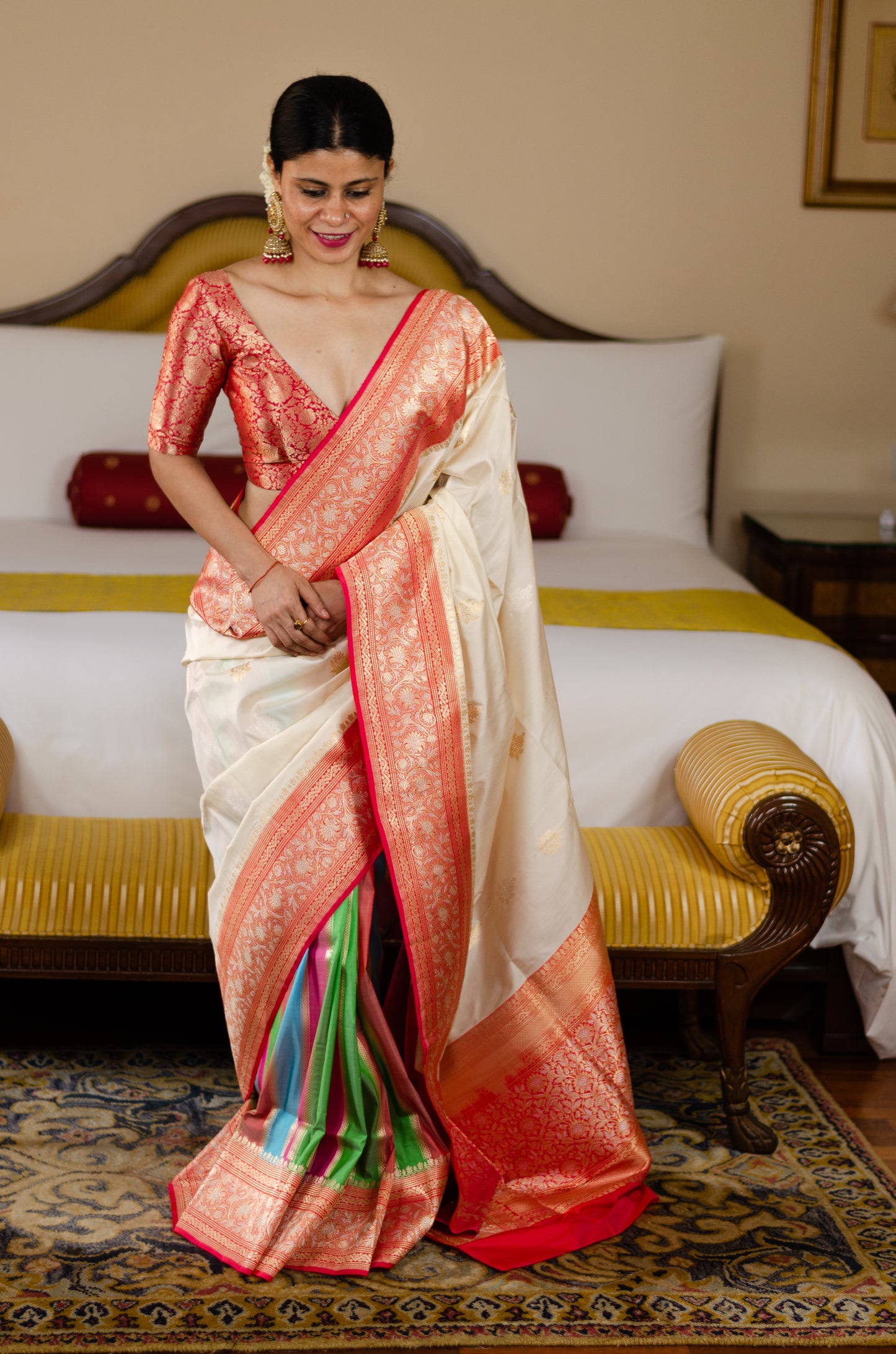 Rich Off white colour anchal and Multicoloured striped in Pleats Pure Katan Silk Kadwa Handwoven Banarasi saree.