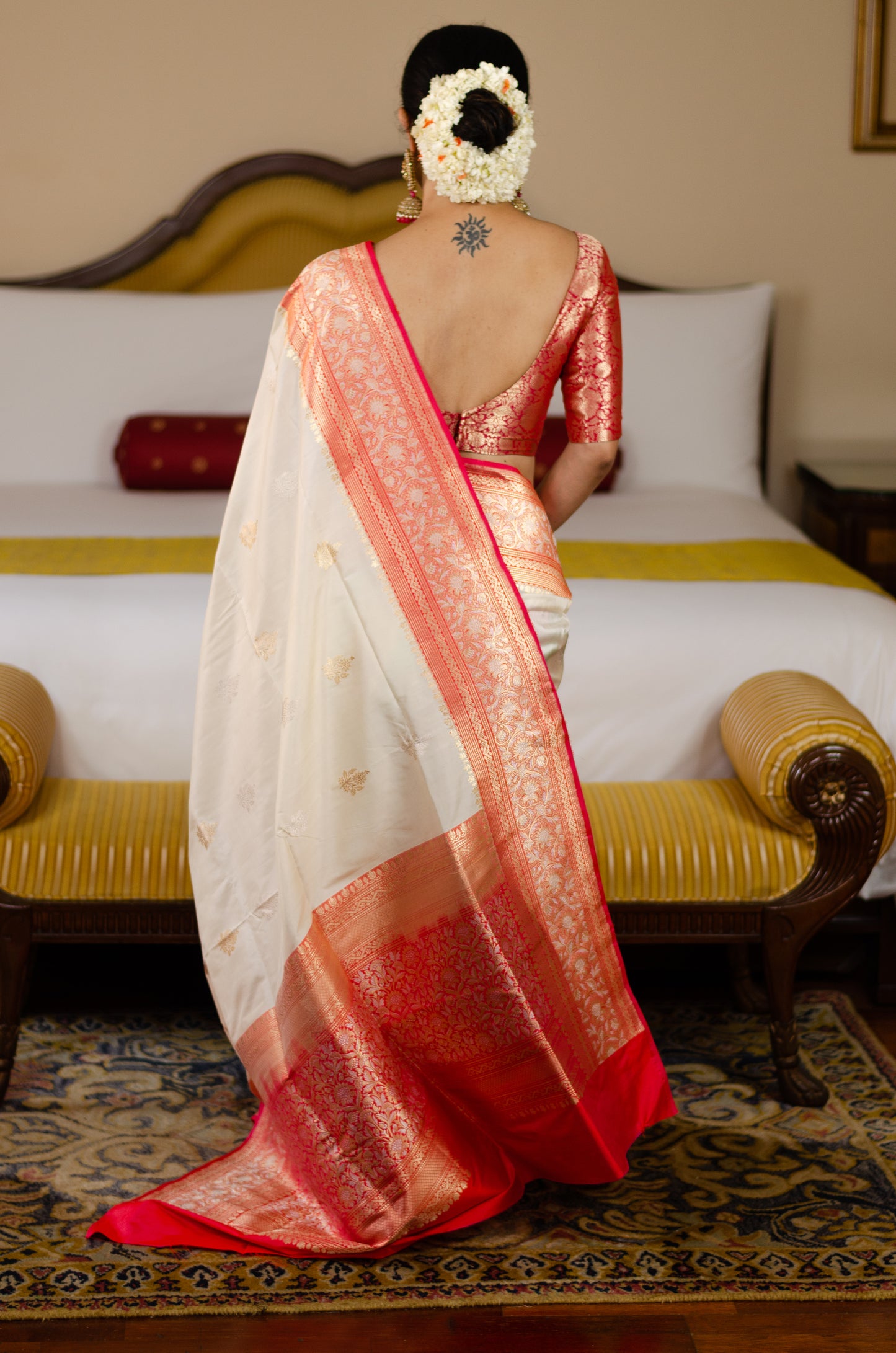 Rich Off white colour anchal and Multicoloured striped in Pleats Pure Katan Silk Kadwa Handwoven Banarasi saree.