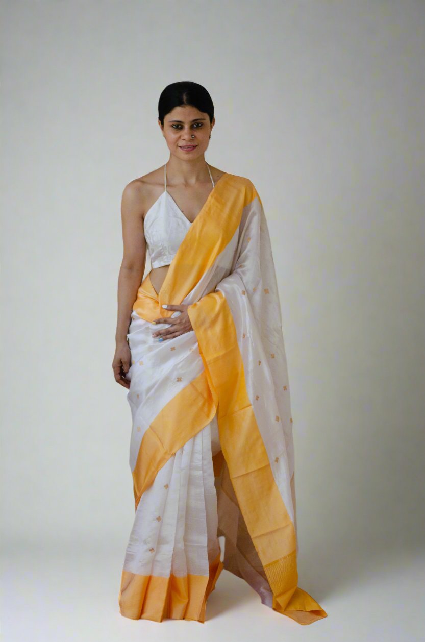 Cream Colour Handloom Chanderi pattu silk Saree with Zari Motifs.