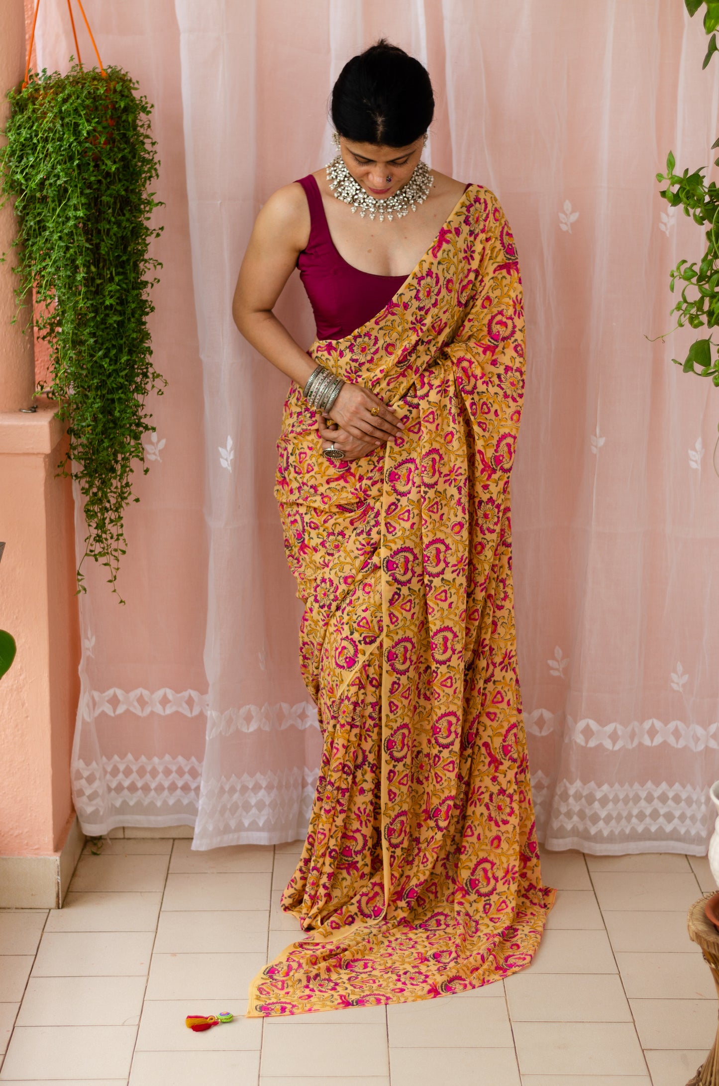 mustard colour with floral handblock printed georgette silk saree