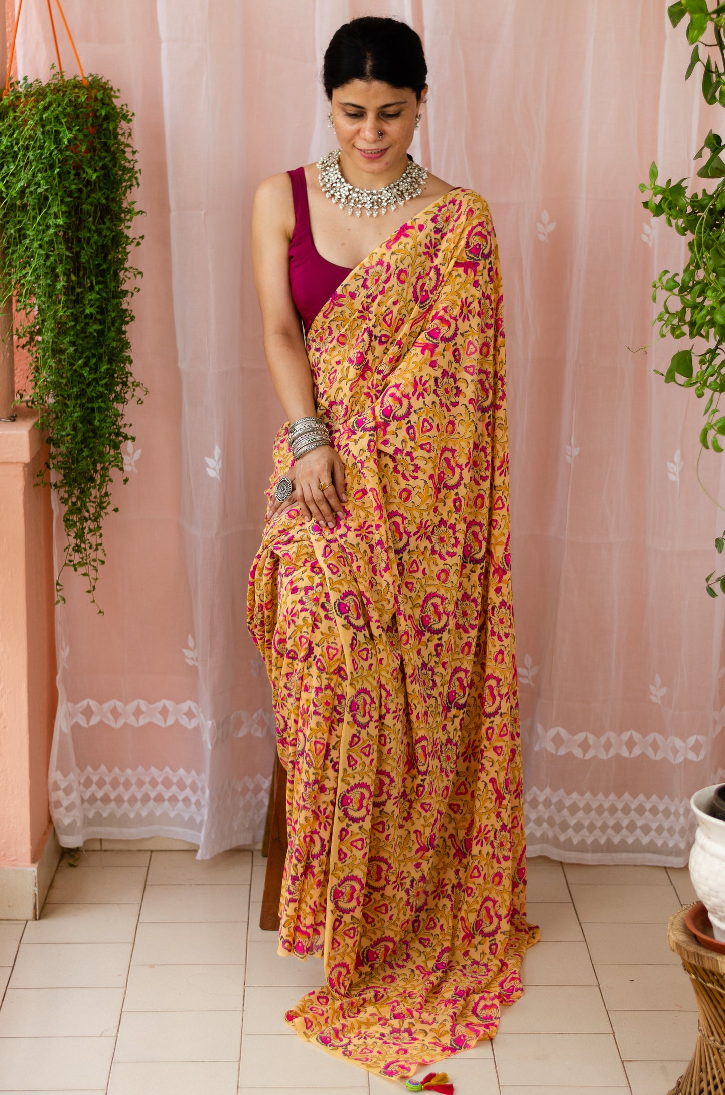 mustard colour with floral handblock printed georgette silk saree