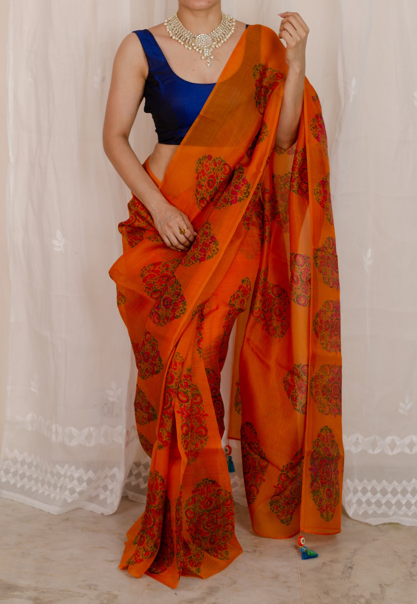 Orange colour handblock printed organza  silk saree