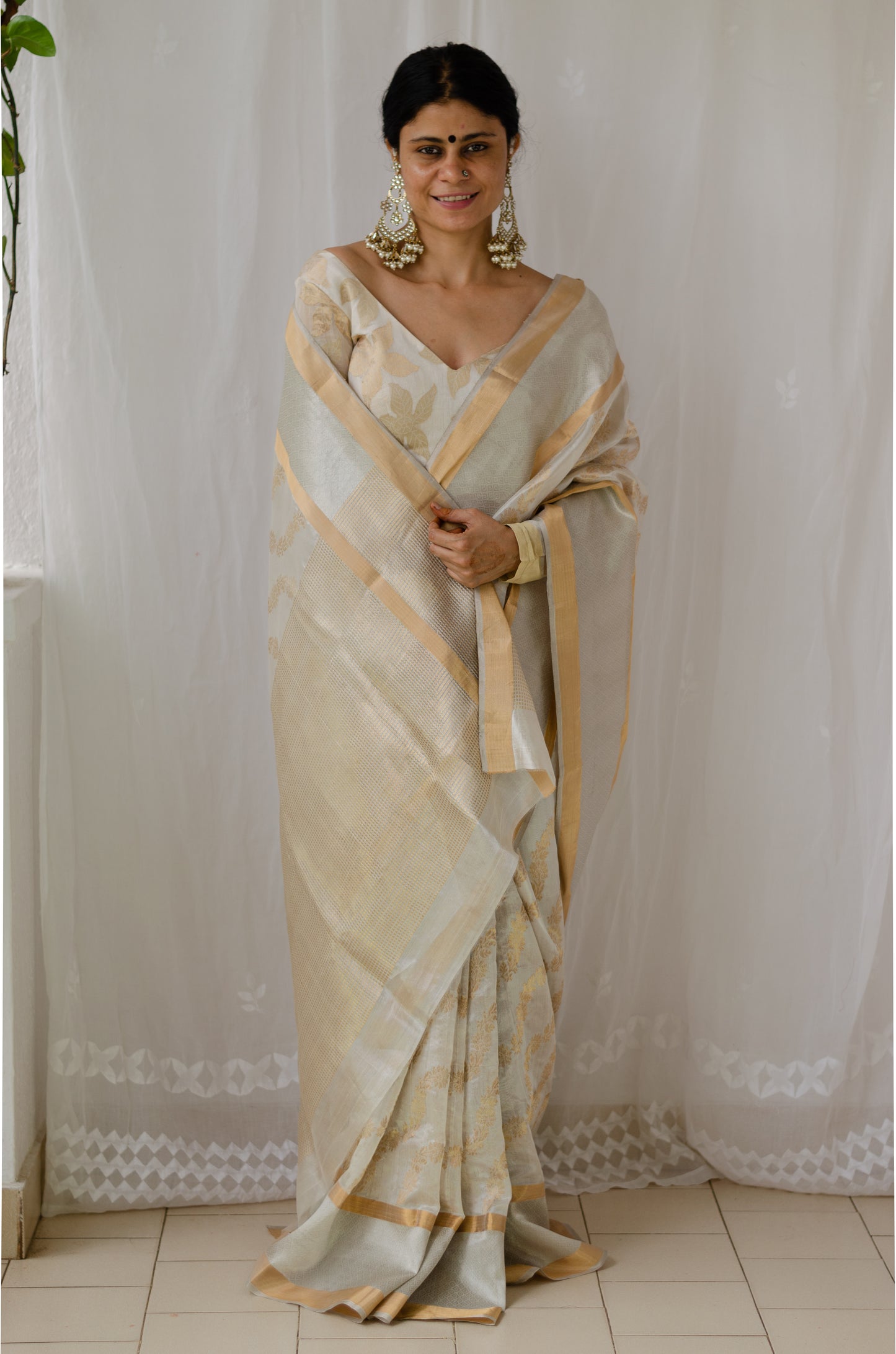Cream Color Handloom Chanderi Pattu Silk With Woven Jaal Motifs in Gold Zari