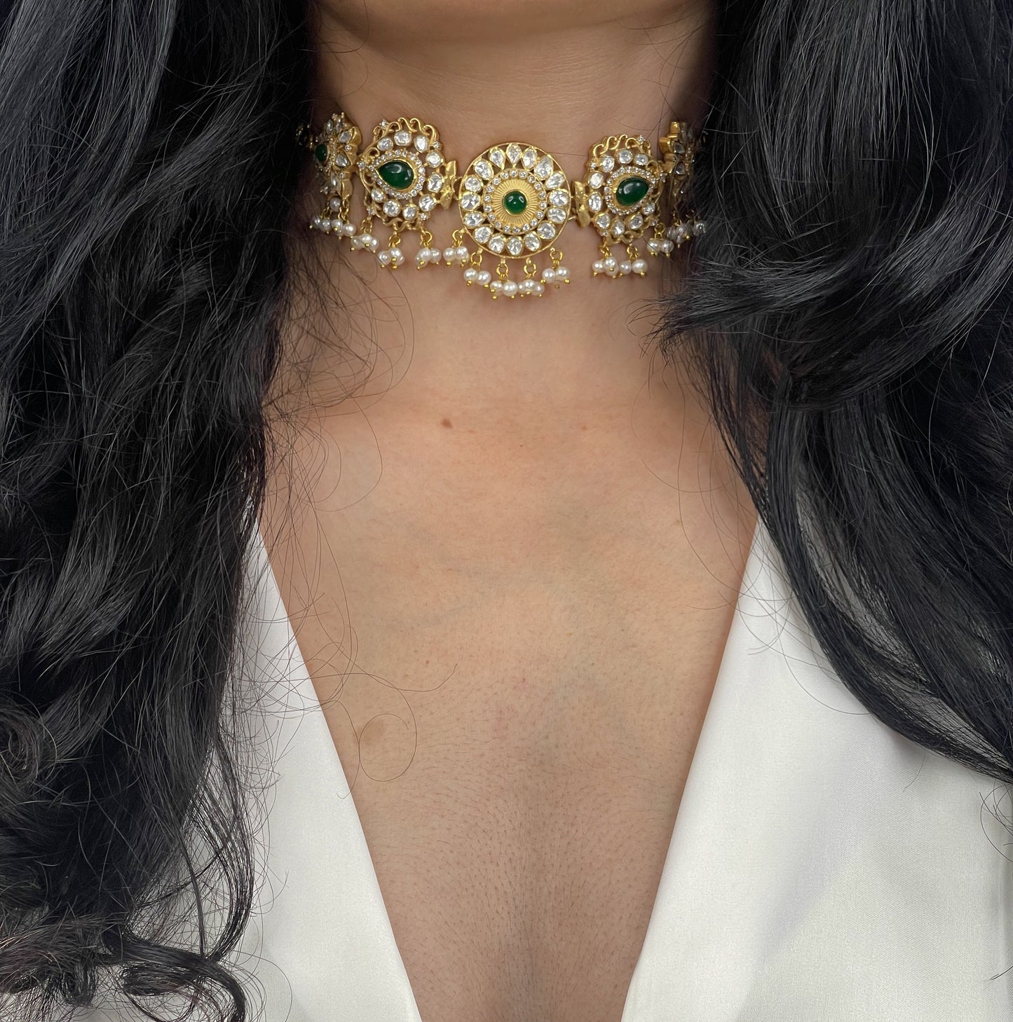 Gold Plated Kundan Choker With stones and pearls  with earrings.