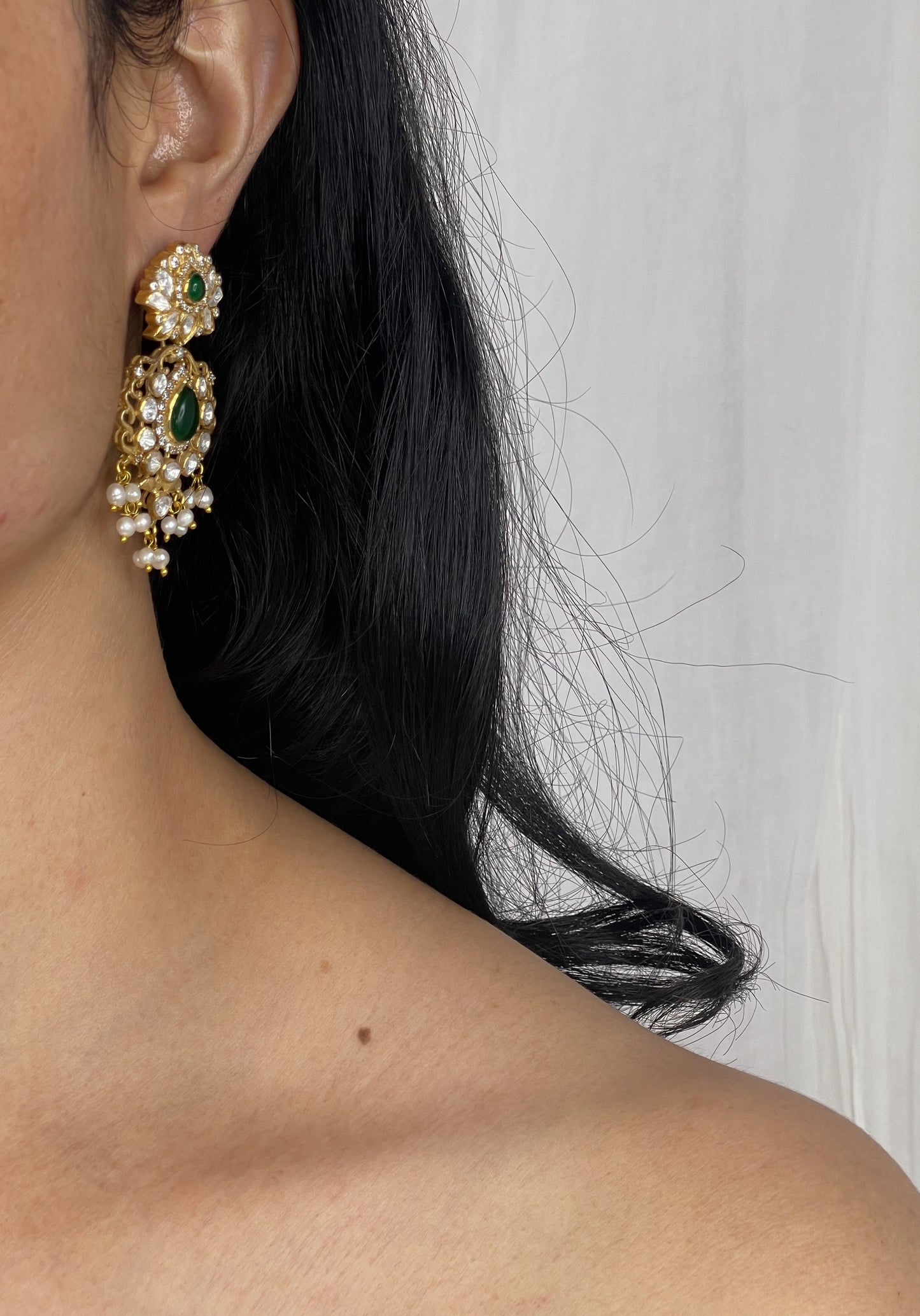 Gold Plated Kundan Choker With stones and pearls  with earrings.