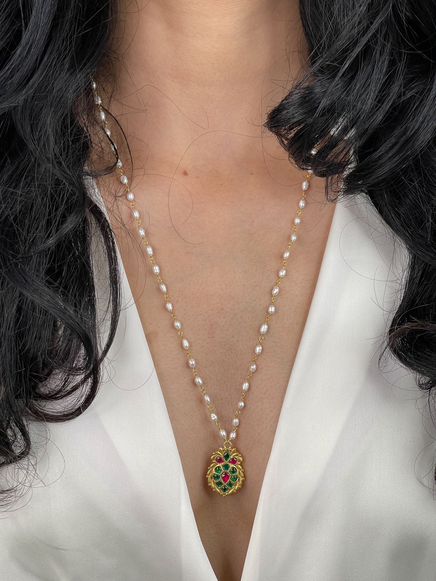 Pearl chain with colour full stone pendant.