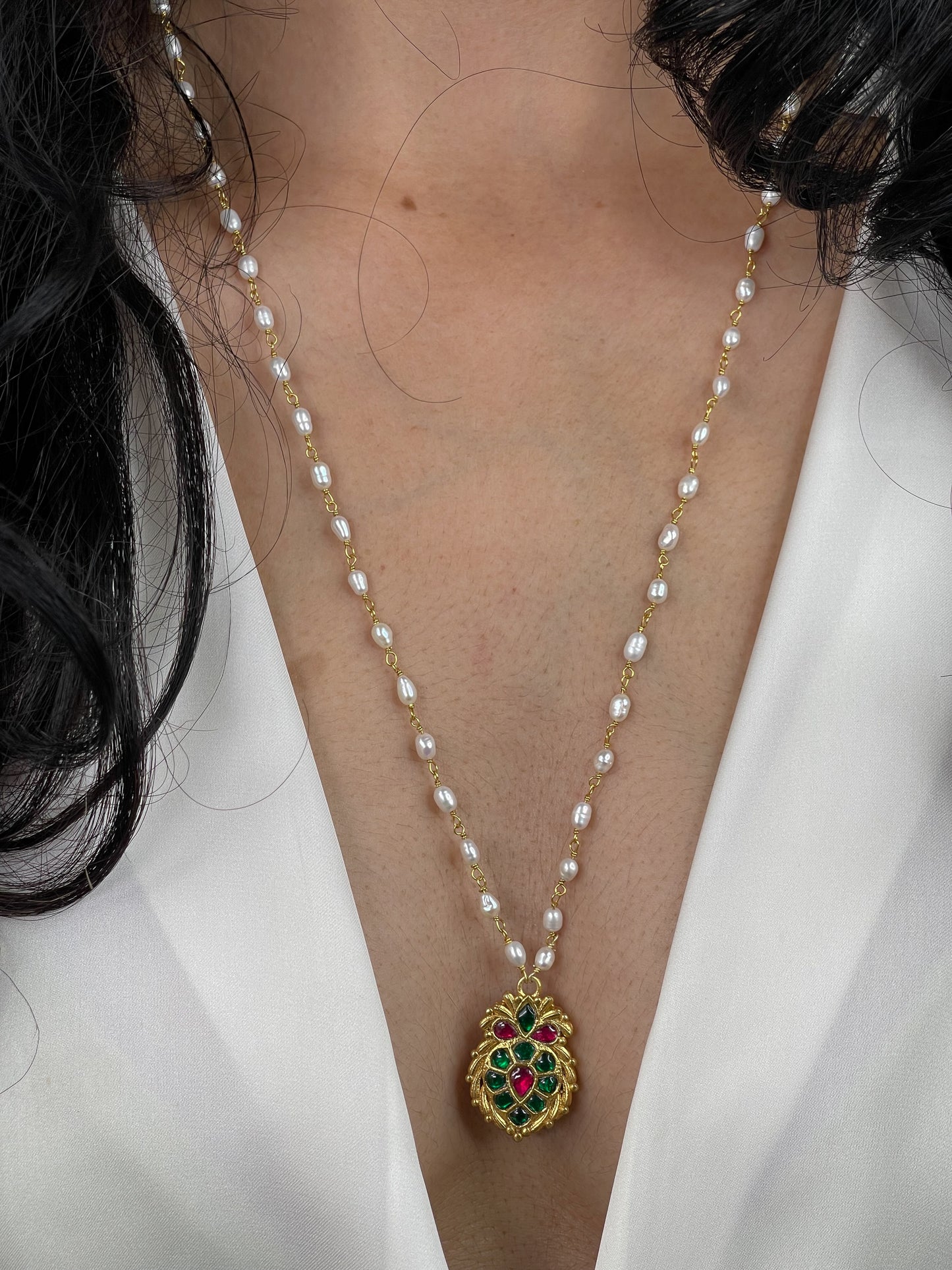 Pearl chain with colour full stone pendant.
